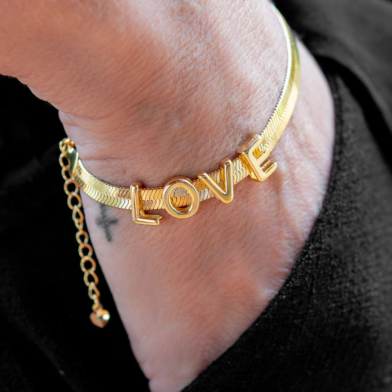 Pulseira Fita Love | Banhada em Ouro 18k